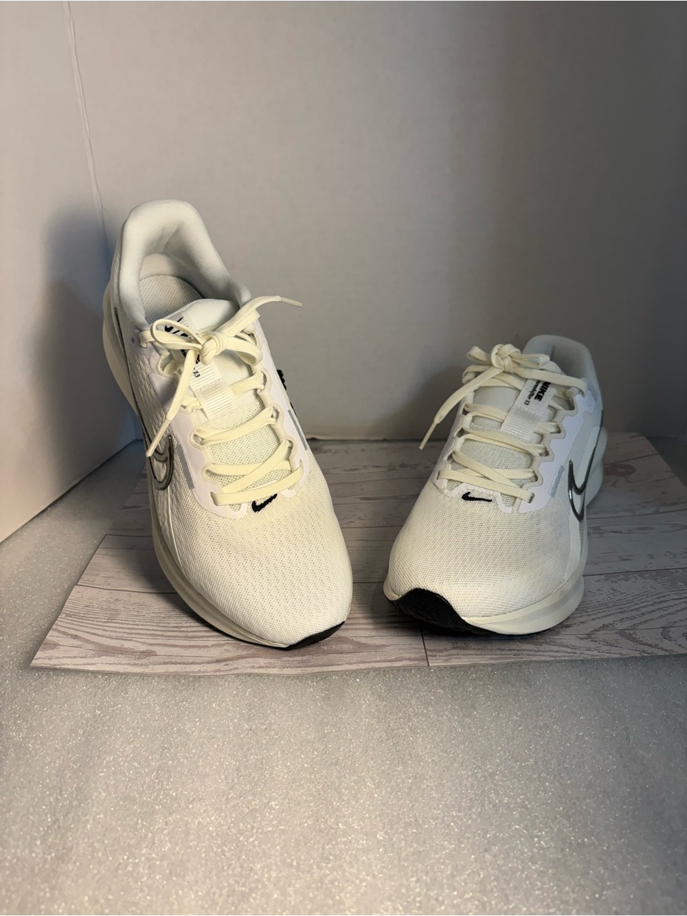 Nike Women's Off-White Running Shoes with Silver Swoosh